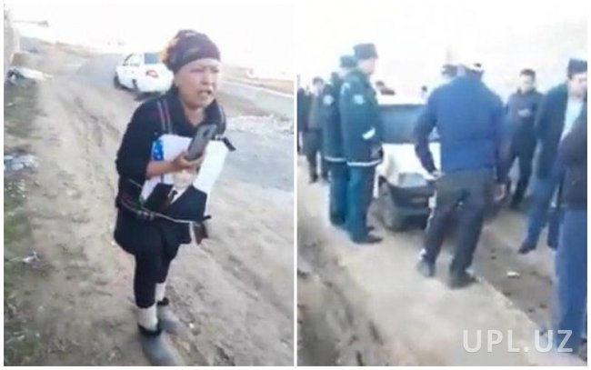 Видео: В Сурхандарьинской области женщина с топором и портретом Президента защитила свой дом от сноса