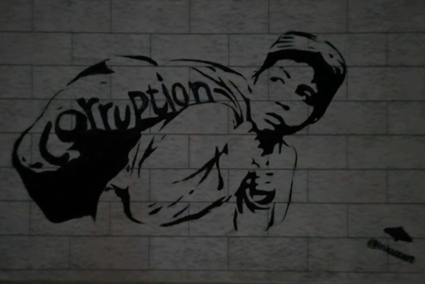 В Ташкенте появилось граффити о коррупции