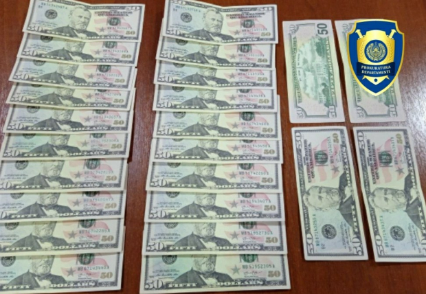 В Андижанской области мужчина погасил долг фальшивыми долларами
